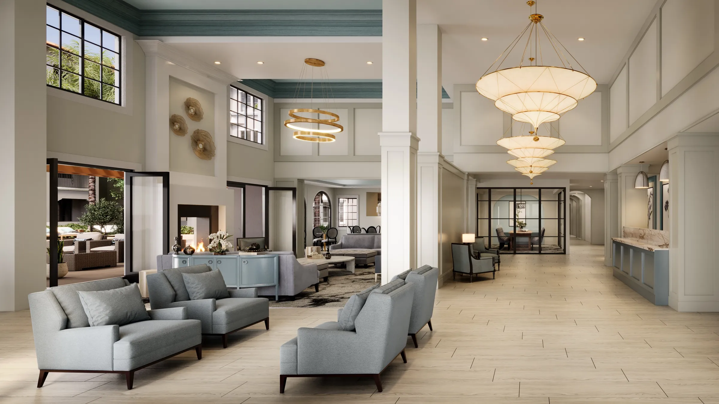 Interior 3D rendering of the lobby at Anindell in Folsom, California, a bright double-height lounge with pale blue sofas, layered tiered chandeliers, a fireplace seating area, and light stone floors leading to the reception beyond.