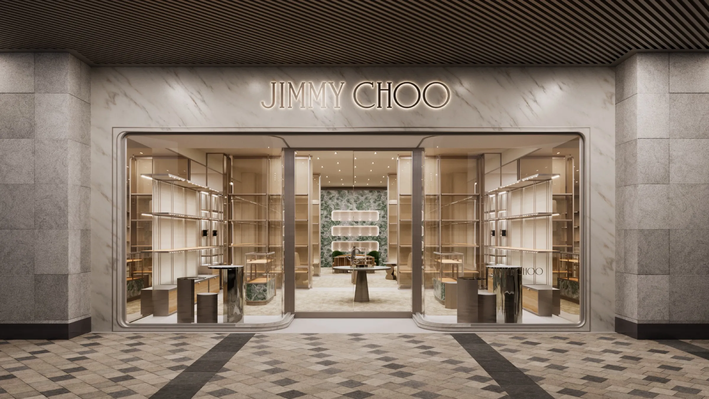 3D rendering of a second Jimmy Choo storefront in Shanghai, green marble and warm timber framing large display windows with Jimmy Choo signage on a mall concourse.