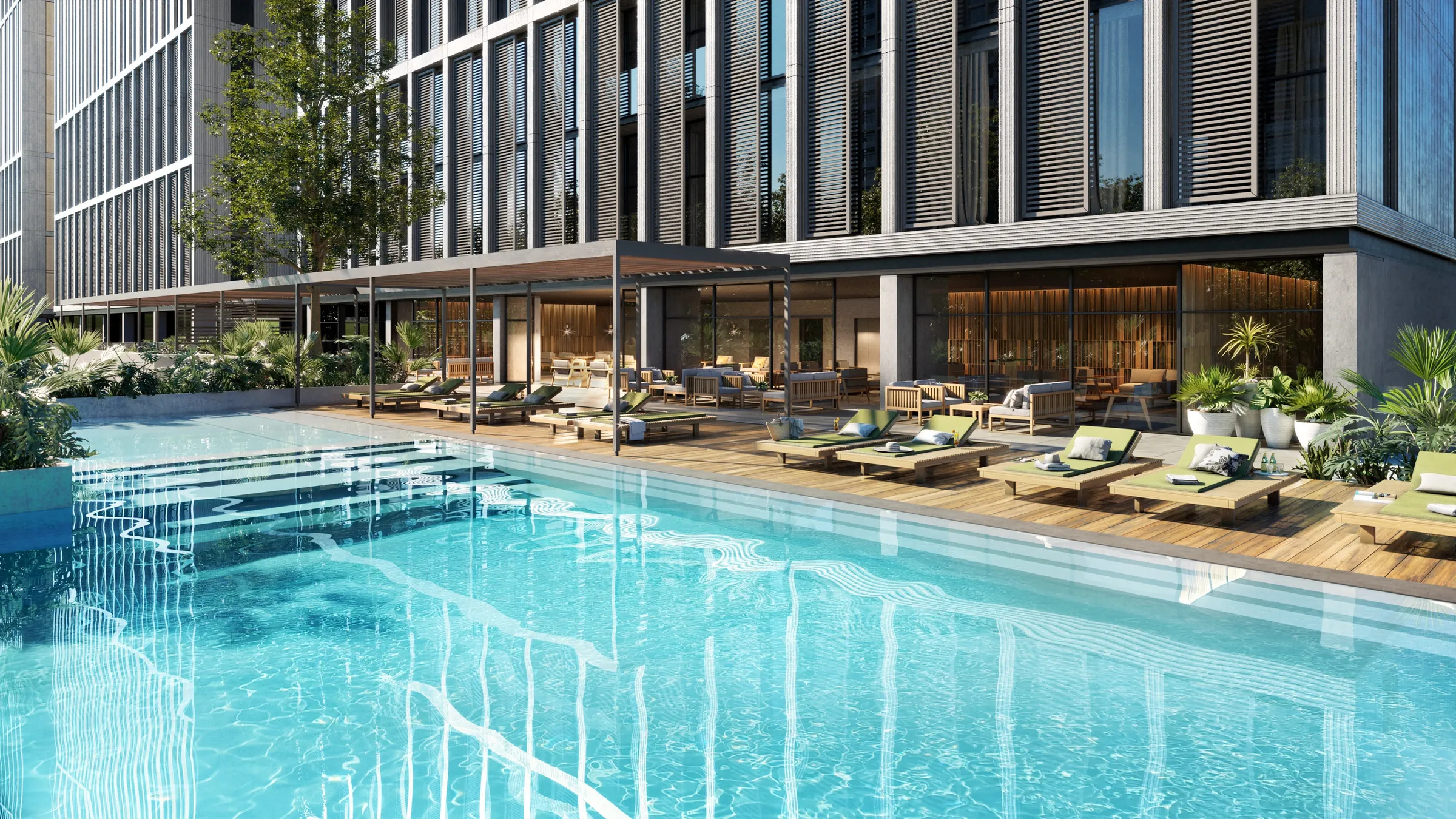 3D rendering of the pool deck at Torres Acacia in Monterrey, a long turquoise pool along the tower base with timber decking, green loungers, and shaded seating under pergolas.