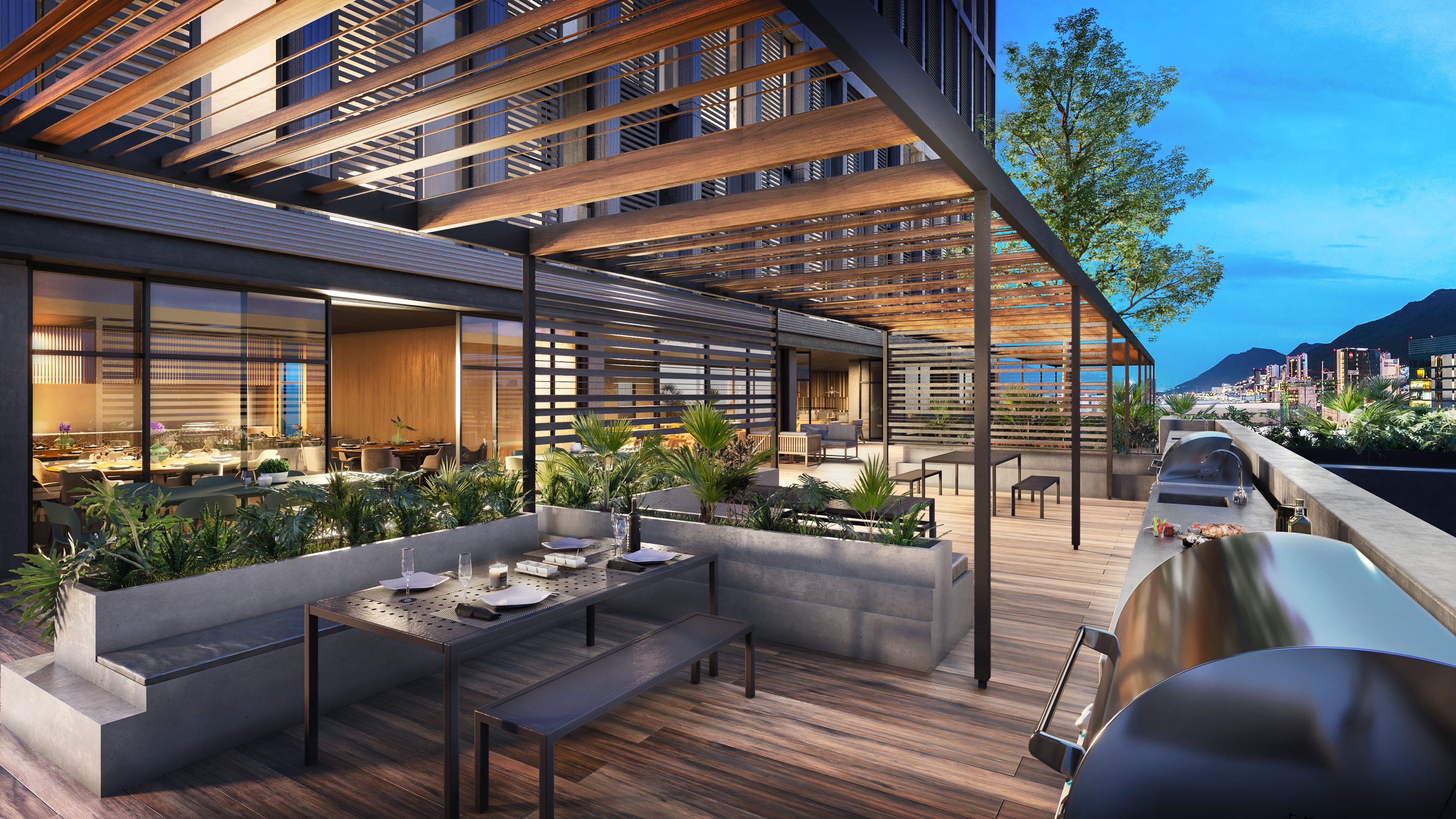 Dusk 3D rendering of the BBQ deck at Torres Acacia, concrete planters and a dining table under a timber pergola, grills along the parapet, and the lights of Monterrey and the Sierra Madre beyond.